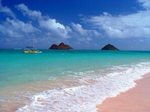 On the beach, sun-loungers, beach towels