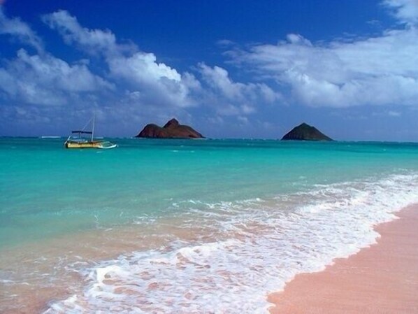 On the beach, sun loungers, beach towels