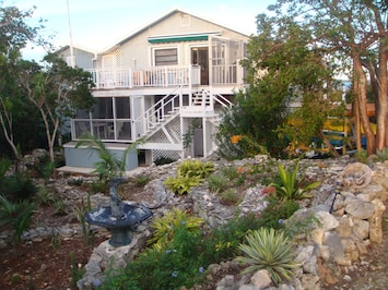 Front view of the villa and terraced garden.