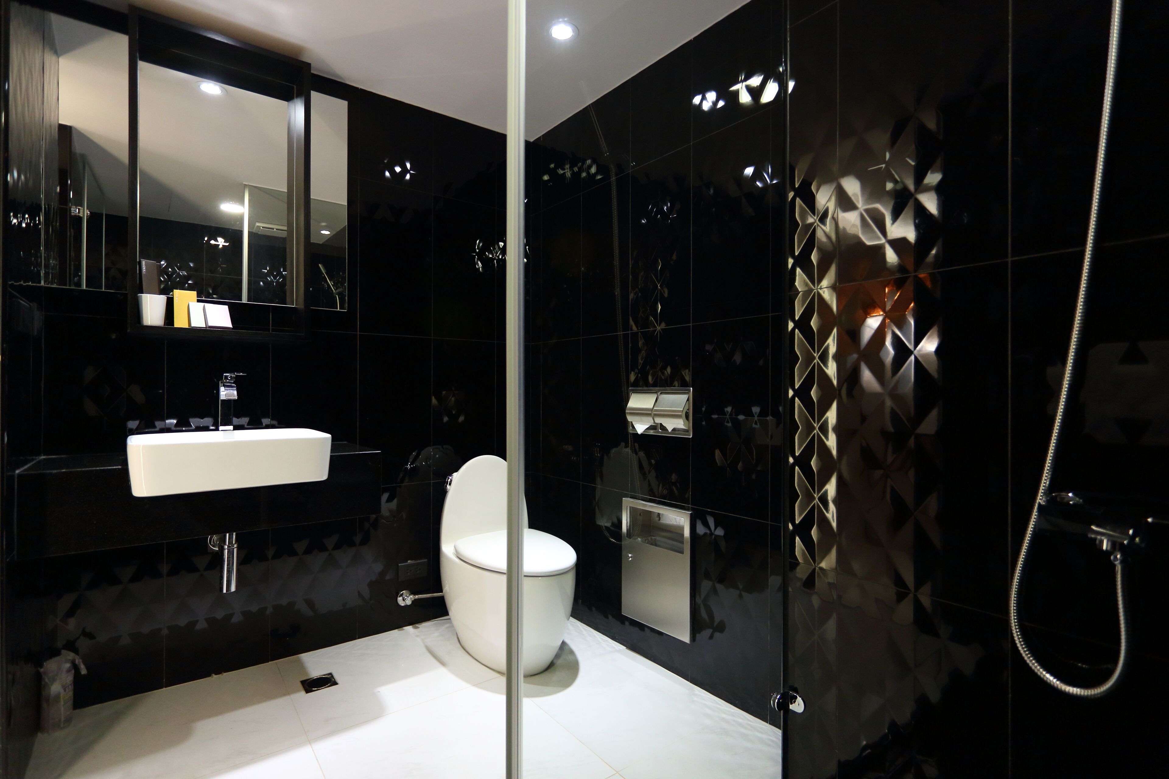 business twin room, no windows | bathroom | shower, hair dryer, slippers, towels