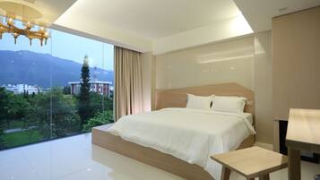 Superior Double Room | Minibar, in-room safe, desk, blackout drapes