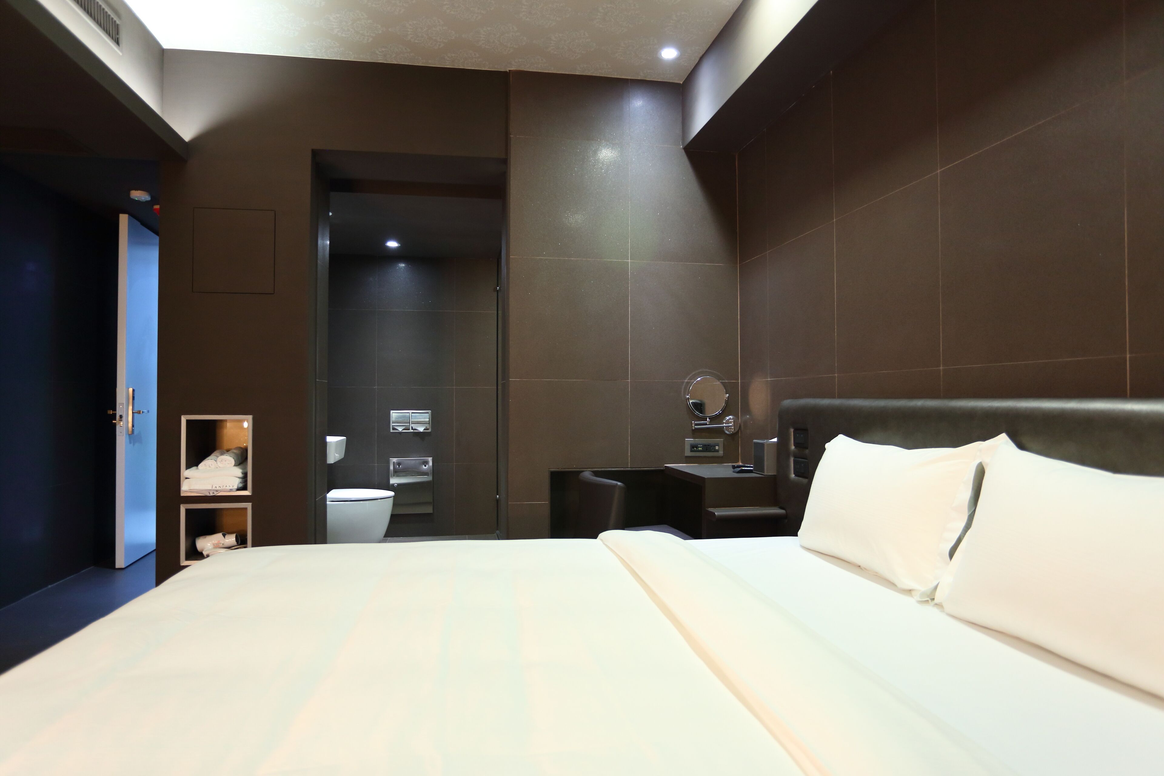 standard double room, no windows | minibar, in-room safe, desk, blackout curtains