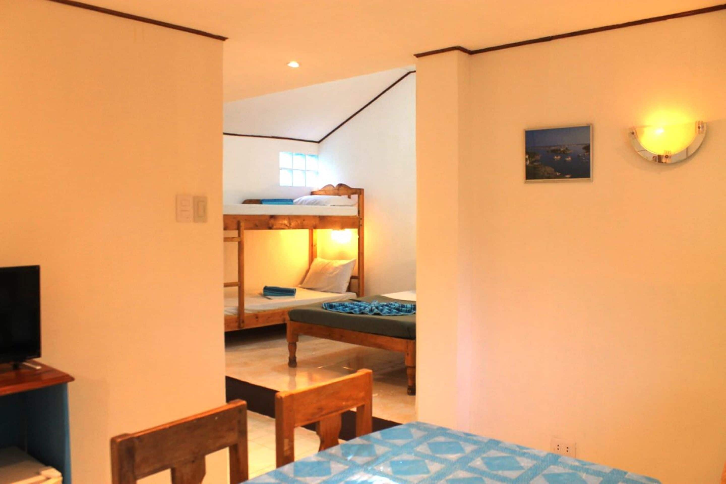 room 4, poolside | 1 bedroom, desk, free wifi, bed sheets