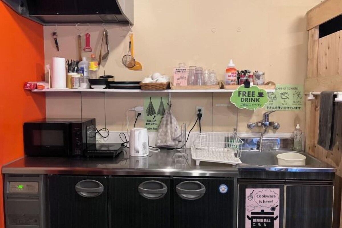 Mini-fridge, microwave, stovetop, cookware/dishes/utensils