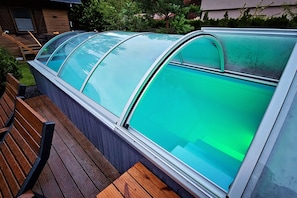 Seasonal outdoor pool, pool loungers