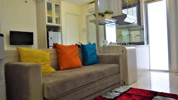 Televisión de pantalla plana de 55 cm con canales por cable