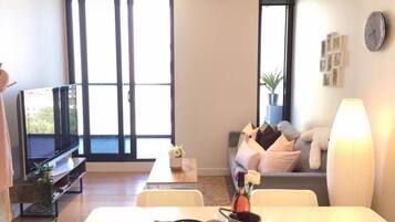 Apartment, 2 Bedrooms | Living area | Smart TV