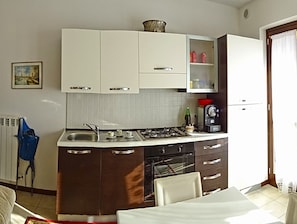 Apartment, 1 Bedroom | Private kitchen | Fridge, oven, stovetop, espresso maker