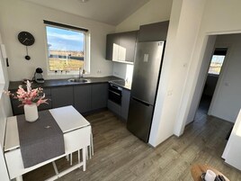 Family House, 1 Bedroom | Private kitchen | Full-size fridge, microwave, stovetop, coffee/tea maker