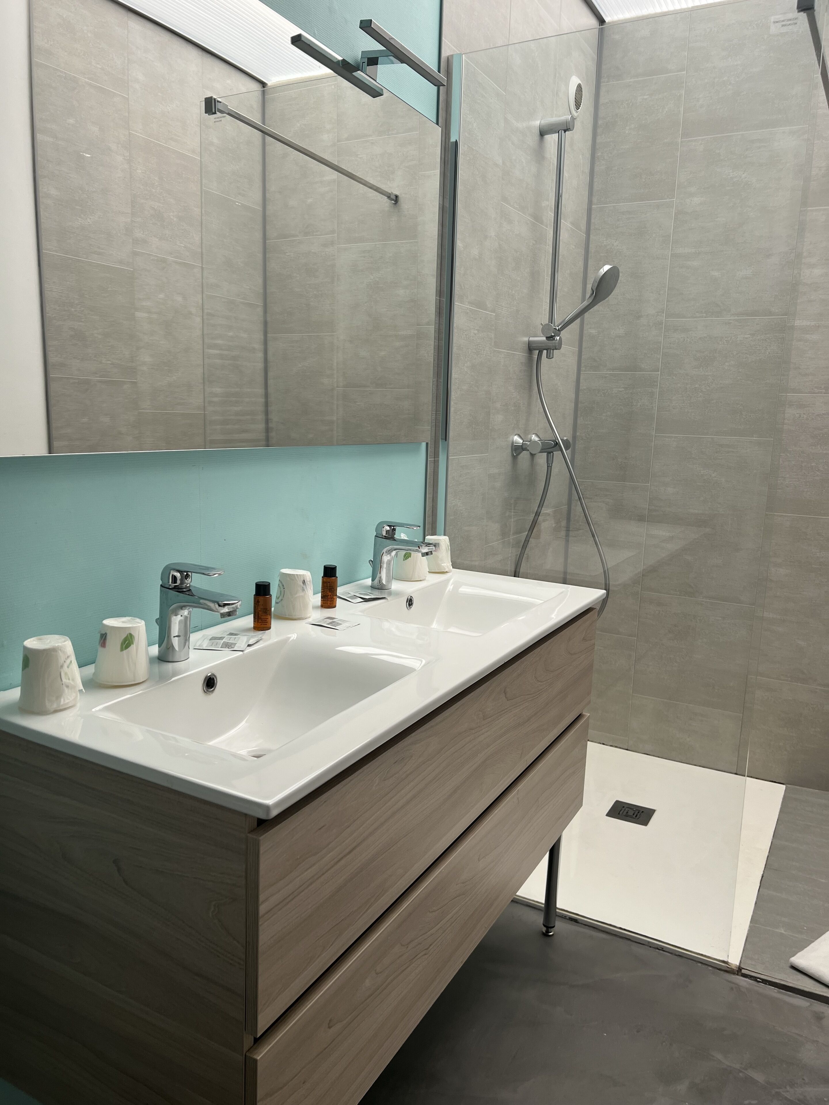 family apartment | bathroom | shower, rainfall showerhead, free toiletries, dressing gowns