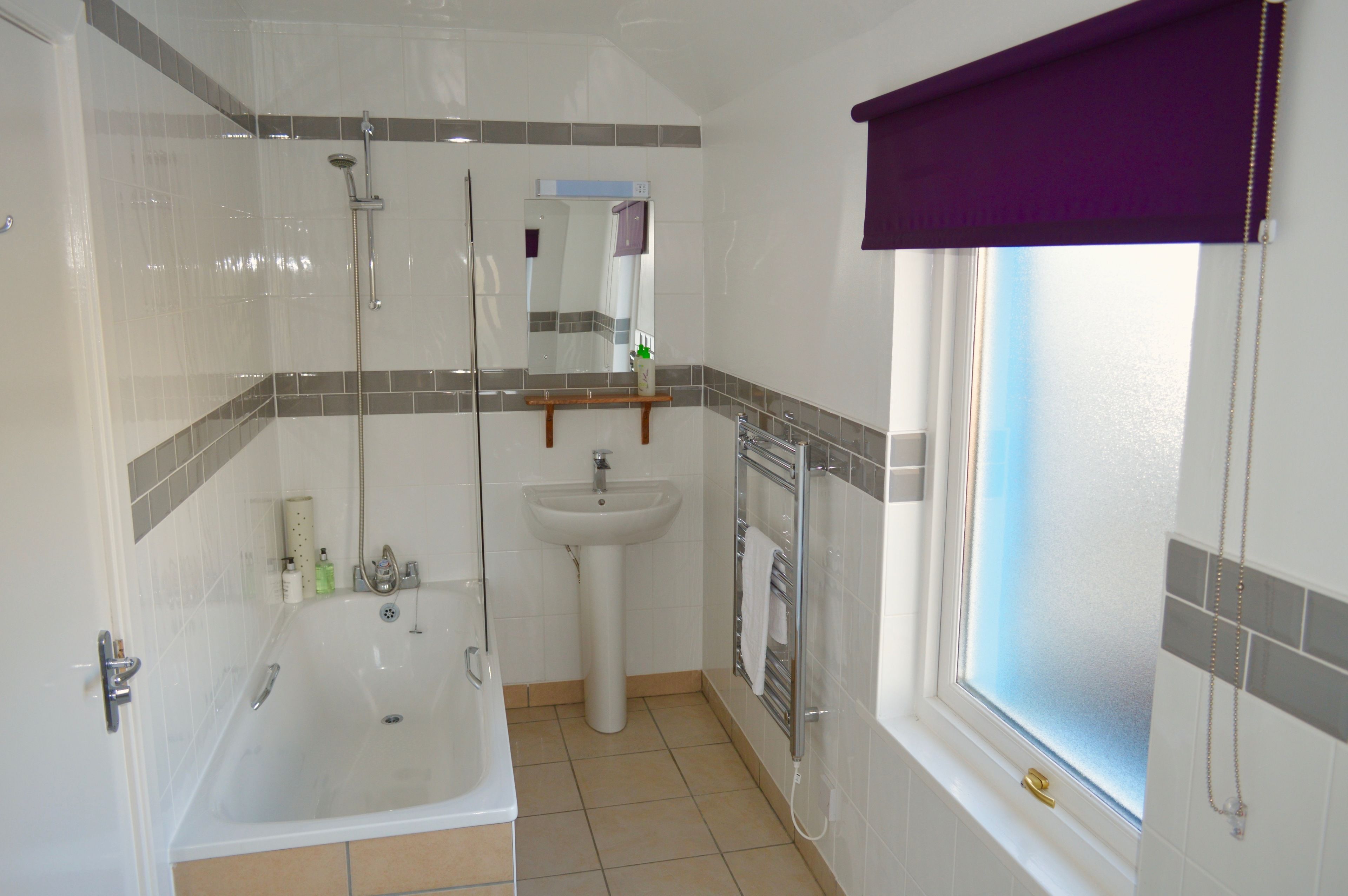 family room, sea view | bathroom | free toiletries, hair dryer, towels