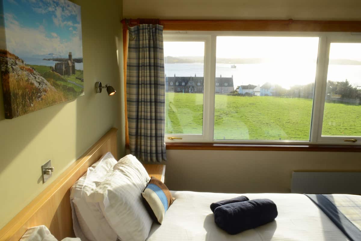 superior double or twin room, sea view | in-room safe, desk, iron/ironing board, free wifi