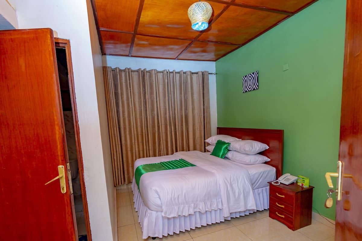 Habitación doble Deluxe, para no fumadores | Sábanas de algodón egipcio y ropa de cama de alta calidad