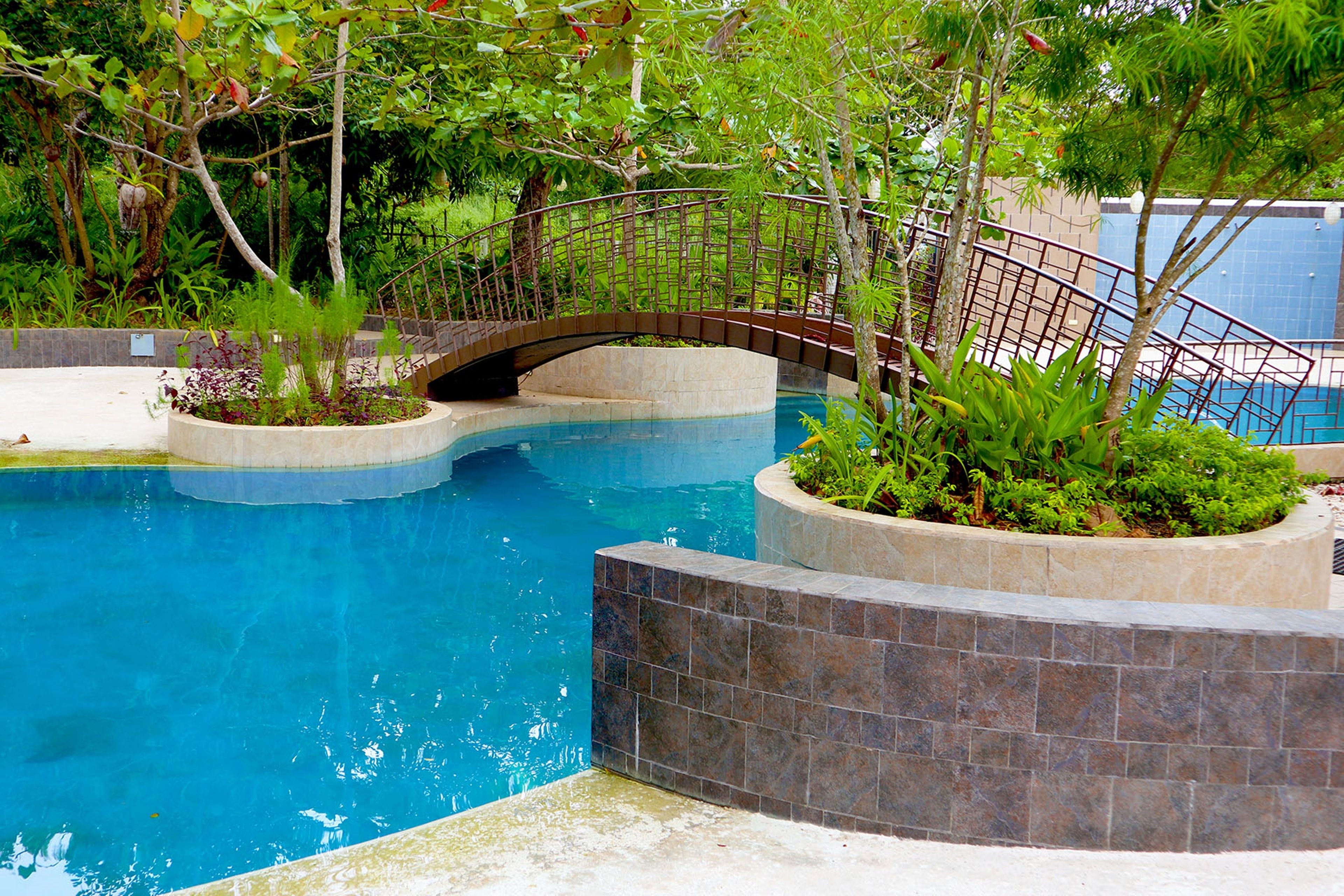 Outdoor pool, sun loungers, lifeguards on site
