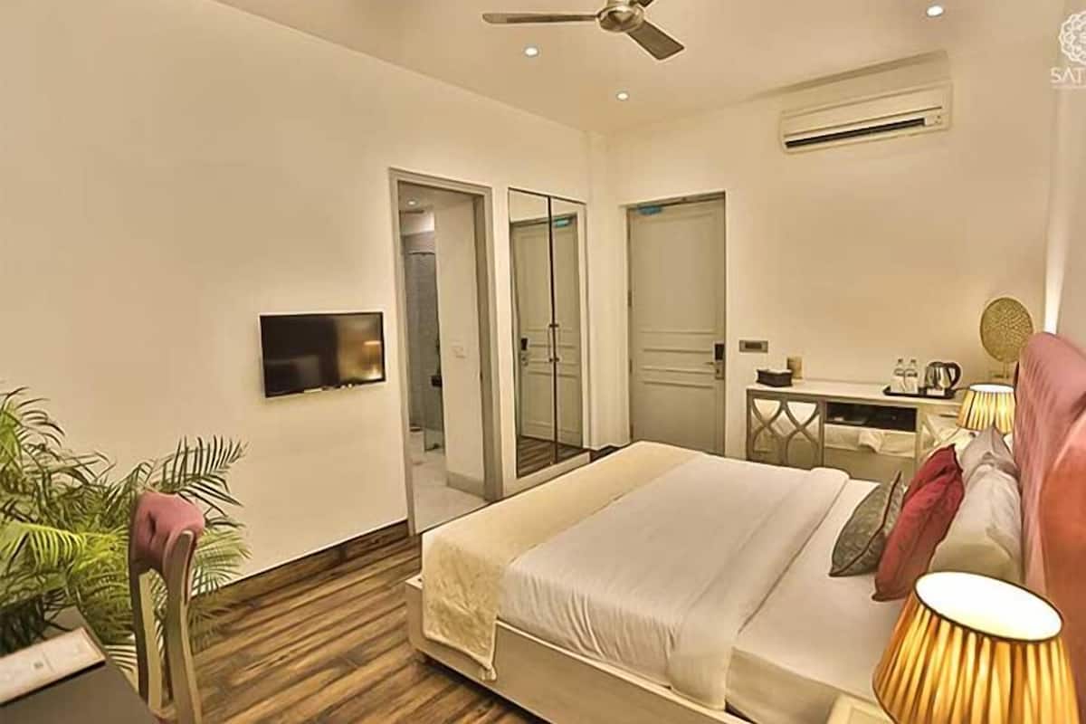 Deluxe Room | 1 bedroom, premium bedding, in-room safe, individually furnished