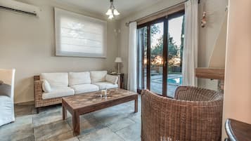 Traditional Villa, Private Pool | Living room | 32-inch flat-screen TV with satellite channels, TV, fireplace