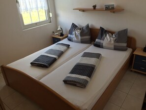 Apartment, Sea view | Wi-Fi (a pagamento), lenzuola