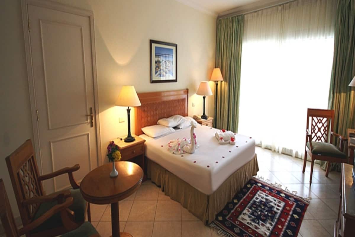 Standard Double Room, Pool View | In-room safe, desk, blackout drapes, bed sheets