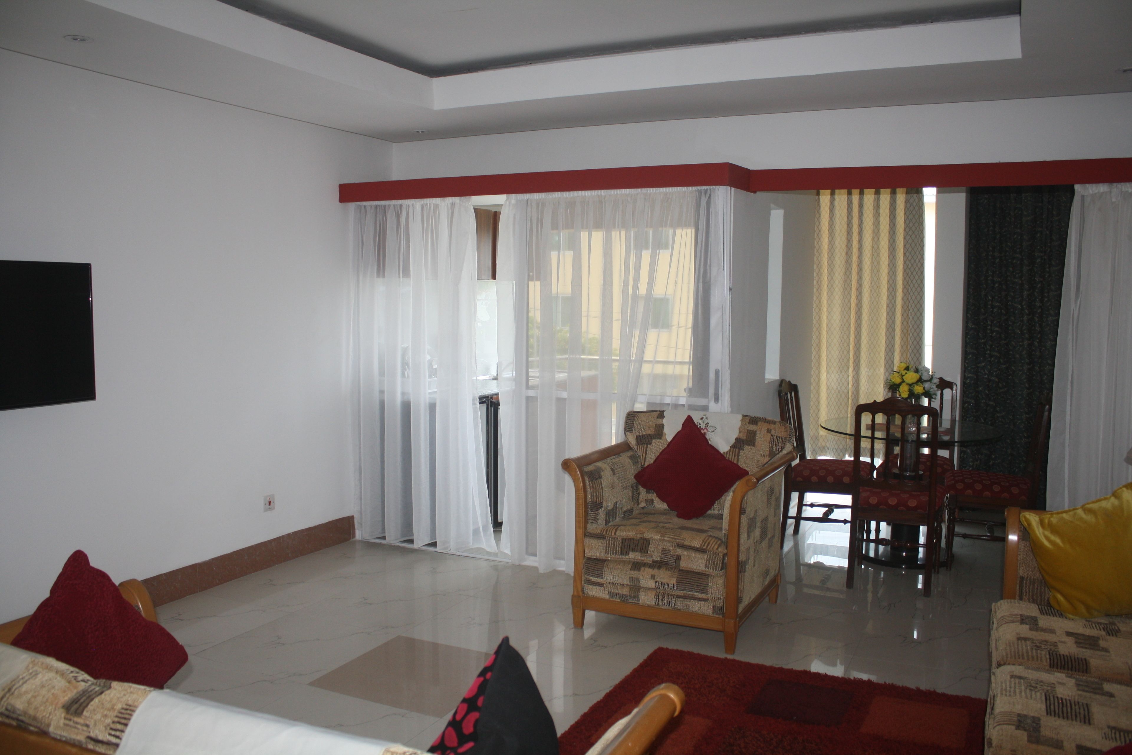 Executive Apartment, 3 Bedrooms, Non Smoking | Living room | 32-inch LED TV with satellite channels, TV