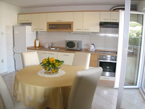 Apartment, Terrace | Private kitchen | Fridge, microwave, stovetop, electric kettle