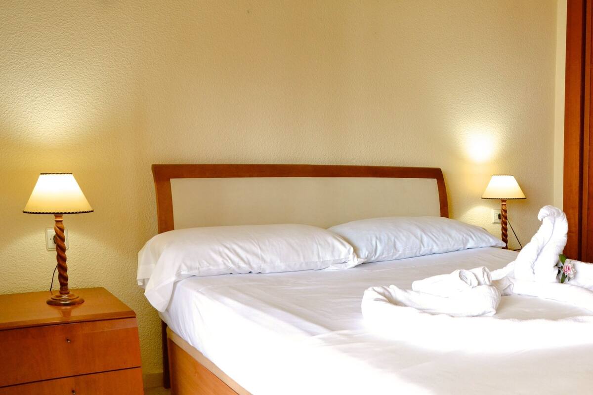 Apartment, 1 Bedroom | 1 bedroom, desk, iron/ironing board, cribs/infant beds