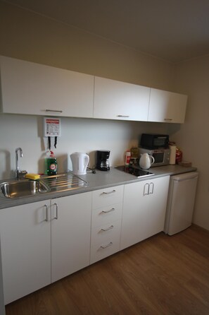 Fridge, microwave, coffee/tea maker, electric kettle