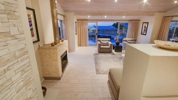 Villa, Multiple Beds, Non Smoking, Mountain View | Living area | 60-inch flat-screen TV with satellite channels, plasma TV, DVD player