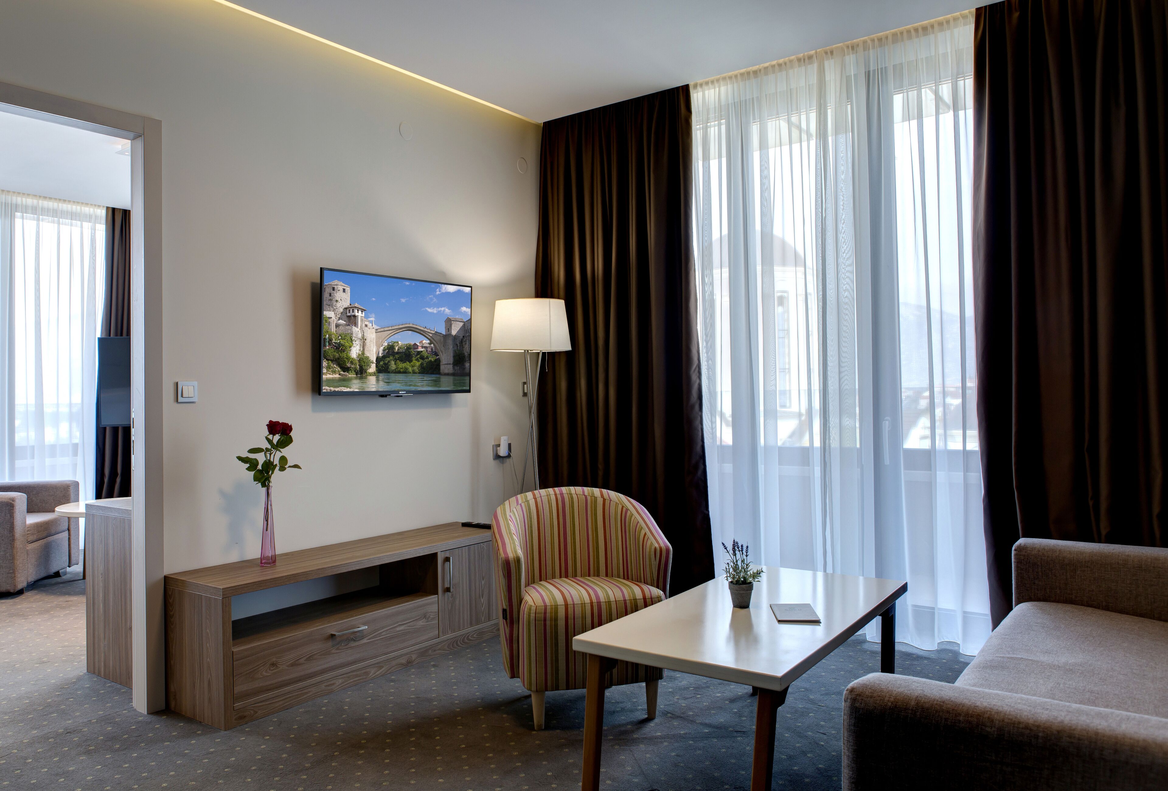 suite, balcony, city view | minibar, in-room safe, desk, blackout curtains