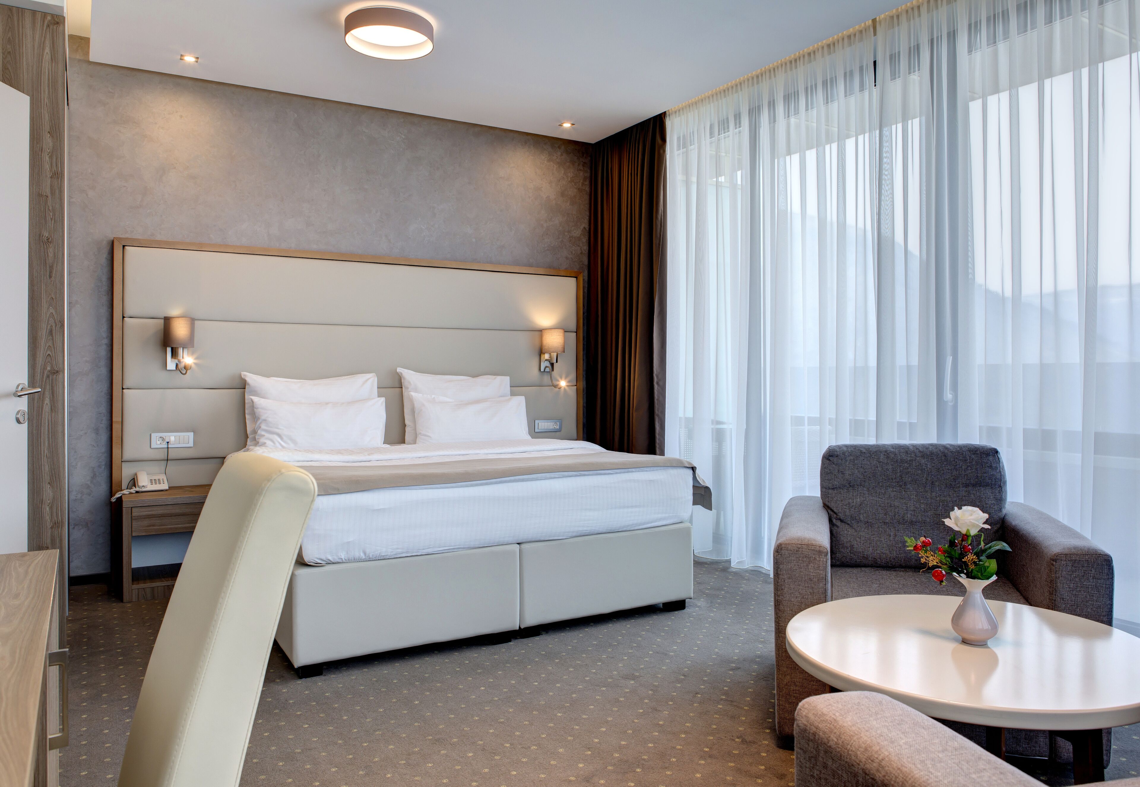 suite, balcony, city view | minibar, in-room safe, desk, blackout curtains