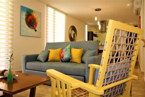 Comfort Apartment, 2 Bedrooms, Poolside (1 King Bed, 2 Single Beds, 1 Sofa Bed) | Living area | Flat-screen TV - Mi Querido Tulum Eco-Chic condo by HA (Tulum)