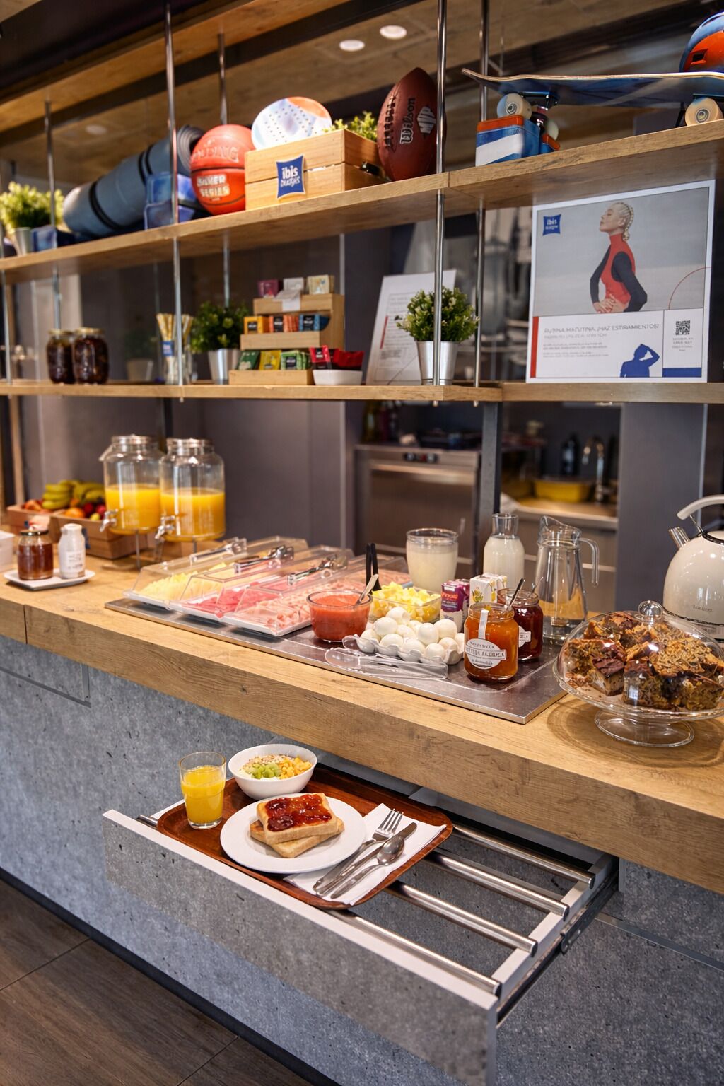 A buffet counter with various food items, condiments, and beverages.