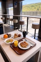 Daily buffet breakfast for a fee