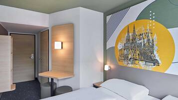 Desk, blackout drapes, soundproofing, free WiFi