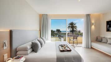 Suite junior, vistas al mar | 1 dormitorio, caja fuerte, escritorio y wifi gratis