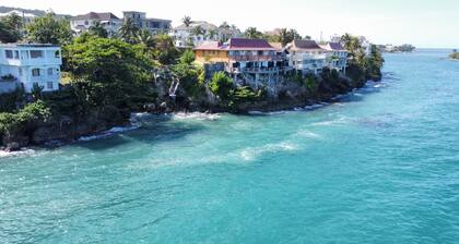 Ship watchers Oceanfront Tiny House Retreat with Mezzanine and Private Jetty