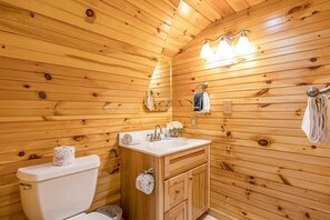 Banheira, secador de cabelo