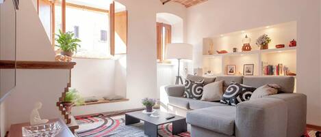 TV, fireplace, books, video library