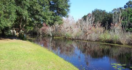 Cozy getaway on large private lot with miles of water!