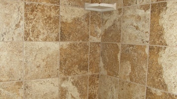Combined shower/tub, hair dryer, towels, soap