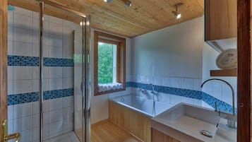Bathtub, hair dryer, towels