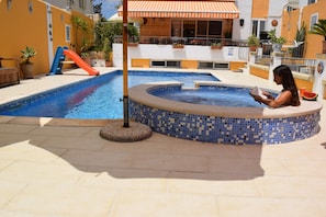 Outdoor pool, pool umbrellas, pool loungers