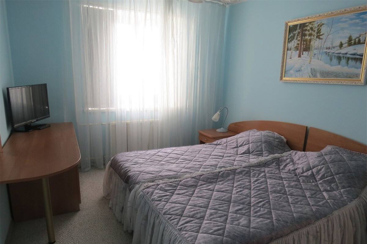 Appartement, 2 eenpersoonsbedden | Een minibar, een kluis op de kamer, een bureau, geluiddichte muren
