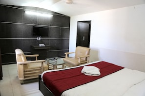 Habitación Deluxe, 1 cama matrimonial, para no fumadores | Camas extra y ropa de cama