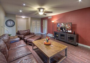 Smart TV, fireplace, DVD player, books