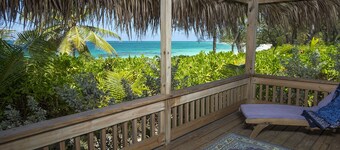 Poponi Cottage on pink sand Beachfront Estate