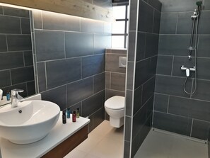 Comfort Studio Suite, Multiple Beds, Garden View | Bathroom amenities | Shower, free toiletries, hair dryer, towels - Villa Clémence (Le Francois)