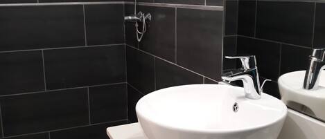 Dusj på badet