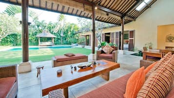 Villa, 4 Bedrooms (Rumi) | Living room | Flat-screen TV