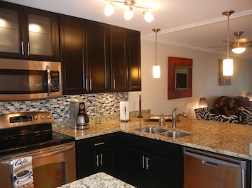 Brand new renovated kitchen with granite & new stainless appliances.