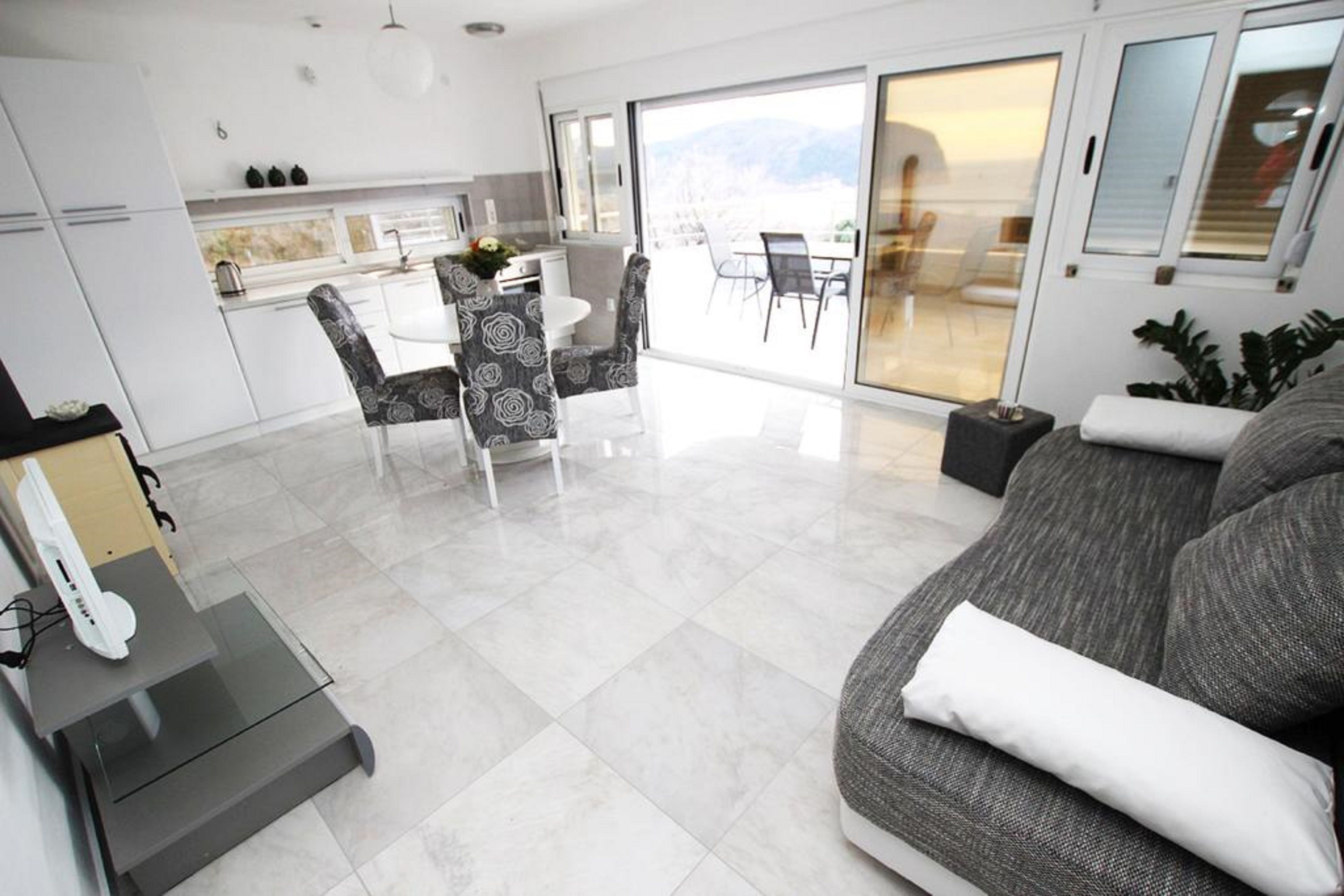 Apartment, 1 Bedroom, Balcony, Sea View | Living area | Flat-screen TV